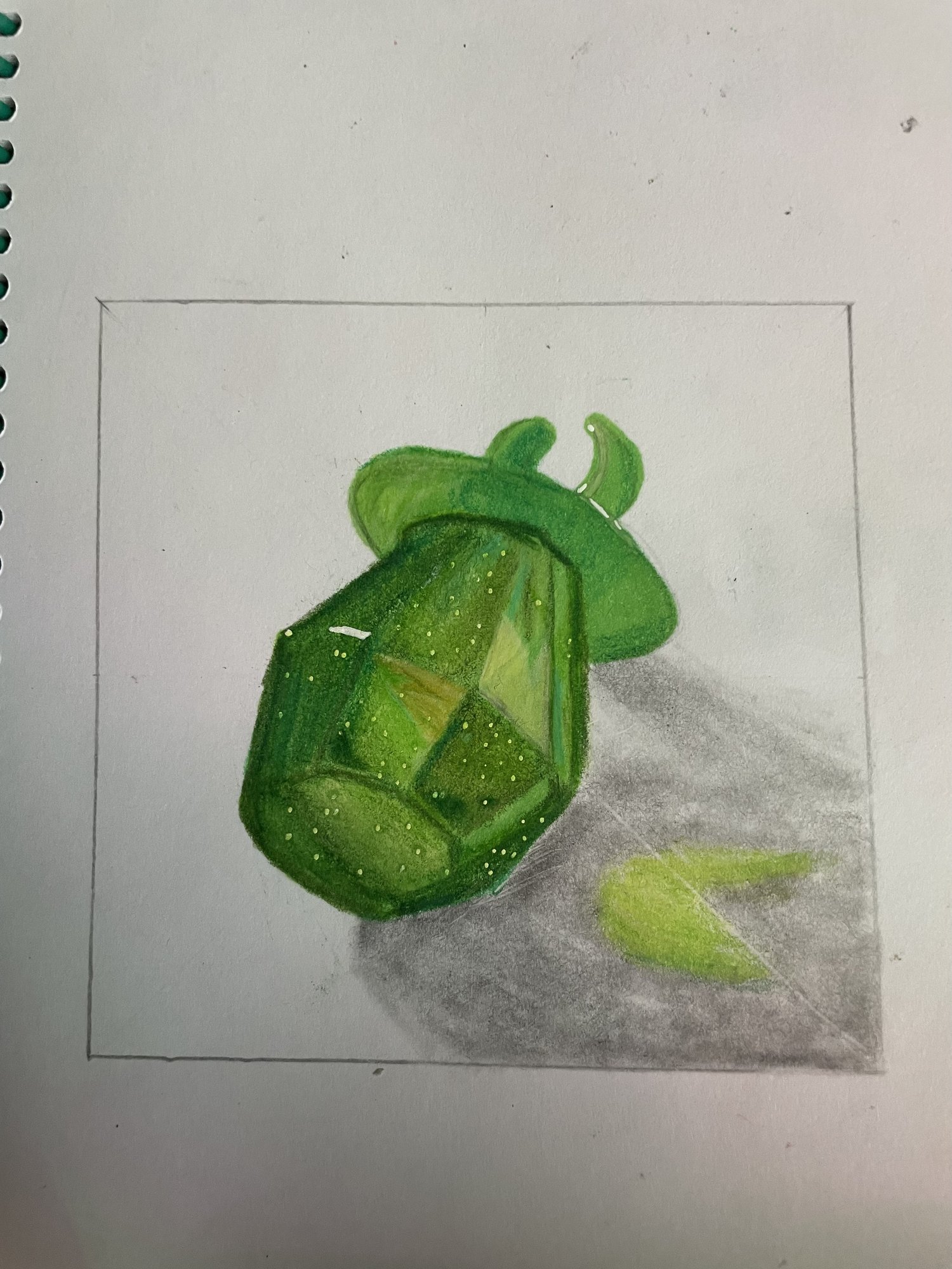 Coloured pencil study of a green bell pepper with a cast shadow, drawn inside a ruled border