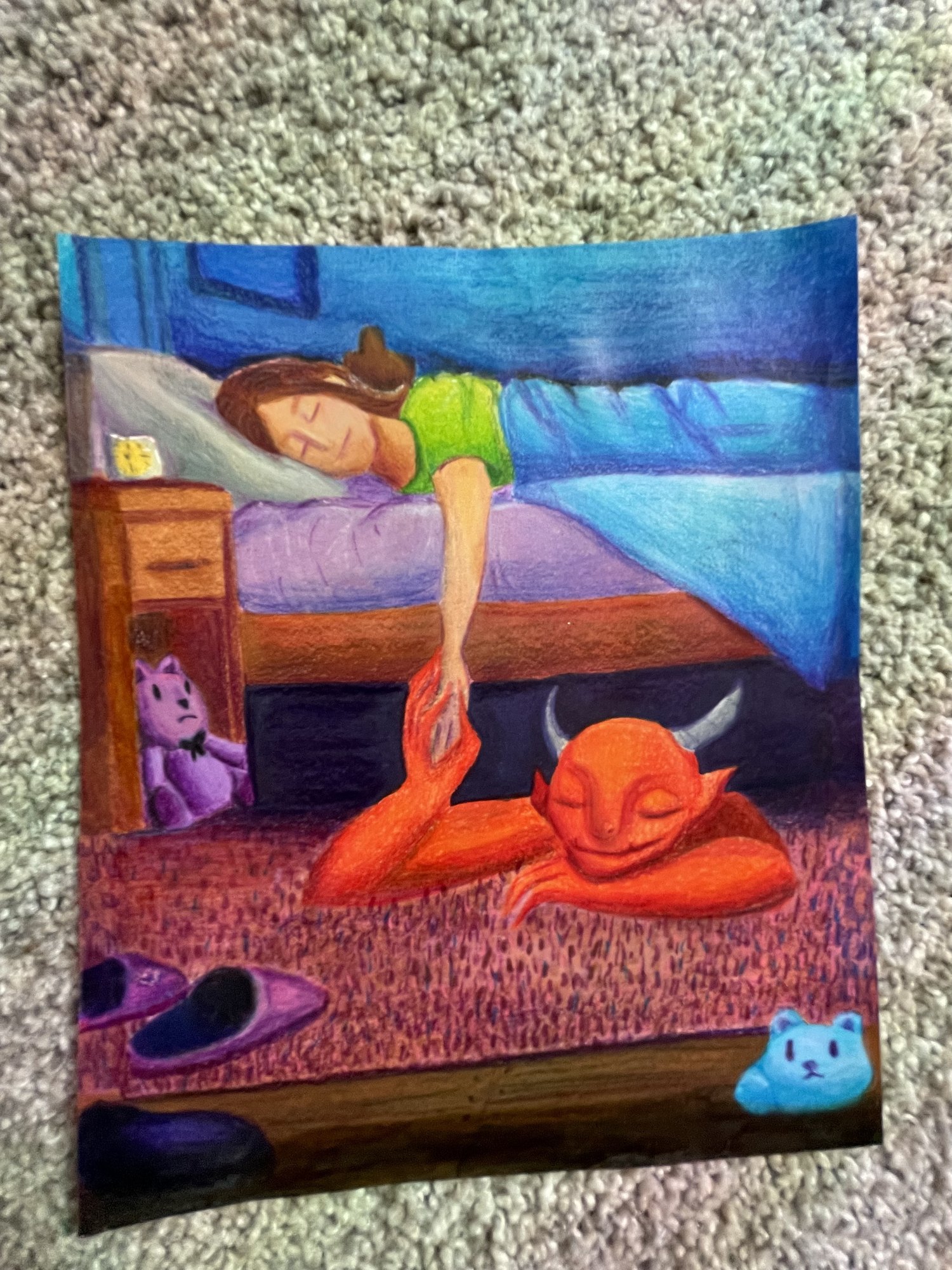 Coloured pencil illustration of a girl asleep in bed with an orange creature curled up underneath